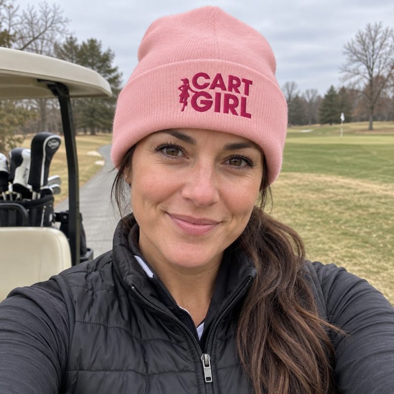 A golfer wearing Cart Girl Bold Logo - Beanie on the course