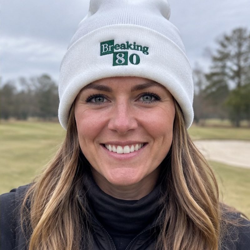 A golfer wearing Breaking 80 - Fun Beanie on the course
