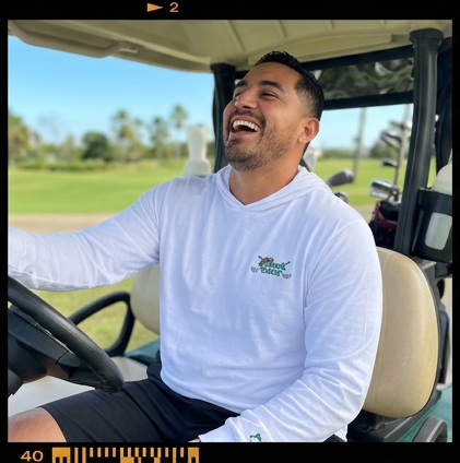 Chingon on the Gren | Hooded Long Sleeve Tee Sweater in a golf lifestyle photo 5