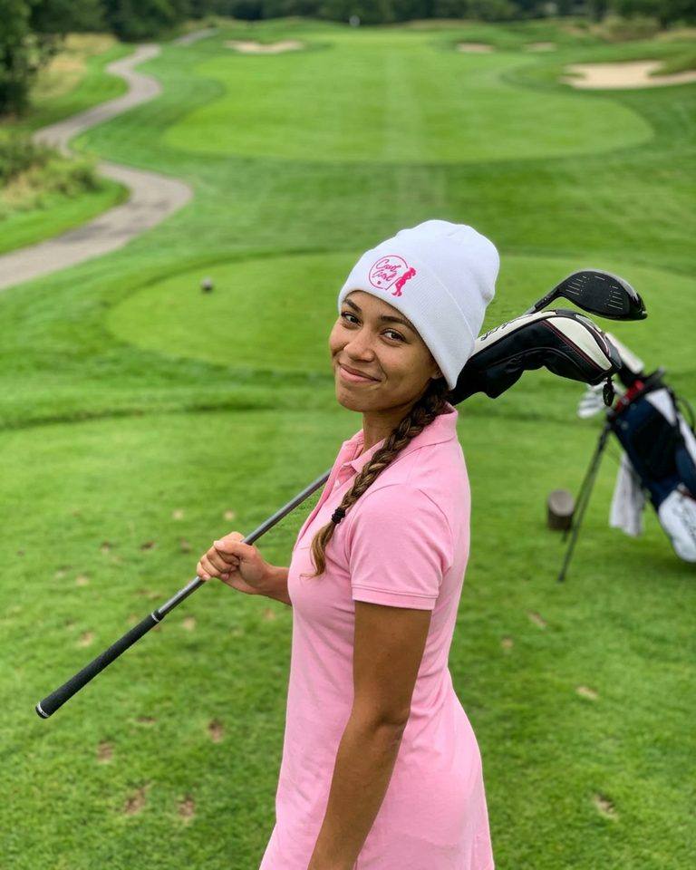 Cart Girl Half Circle Logo - Beanie in a golf lifestyle photo 1