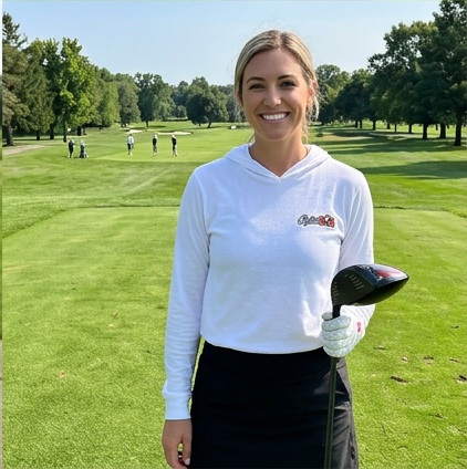 A golfer wearing Captain Hook | Hooded Long Sleeve Tee Sweater on the course