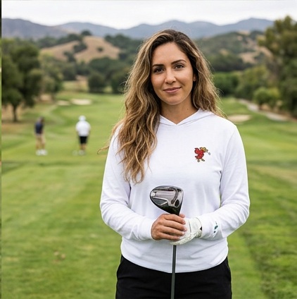 A golfer wearing Mexican Eagle Iron Shot | Hooded Long Sleeve Tee Sweater on the course