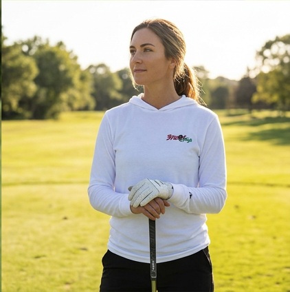 A golfer wearing 3 Putt Ninja | Hooded Long Sleeve Tee Sweater on the course