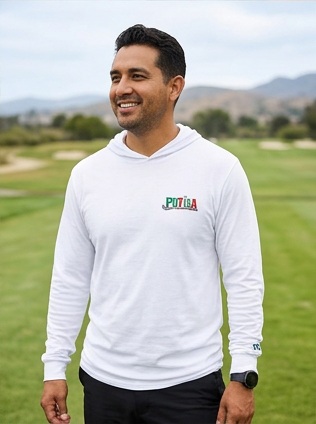A golfer wearing Putisa | Hooded Long Sleeve Tee Sweater on the course