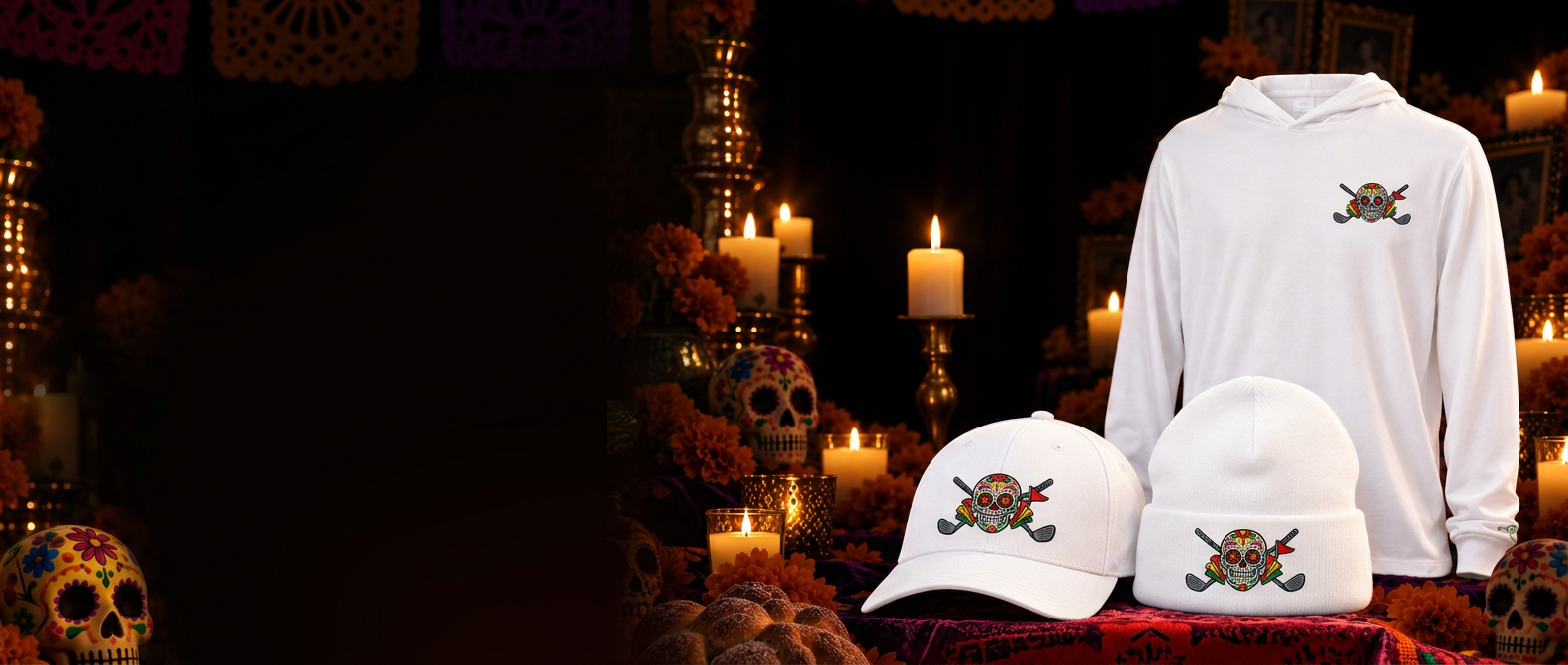 The matching white Dia de los Golferos Flexfit cap, cuffed beanie and hooded long sleeve tee, surrounded by marigolds and candles.