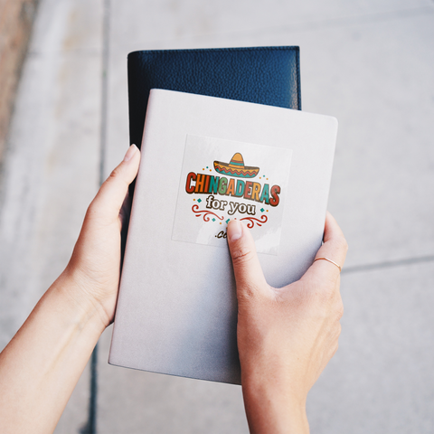 Chingaderas_for_You_Sticker_ClearSquareSticker_Notebook_Mockup.png
